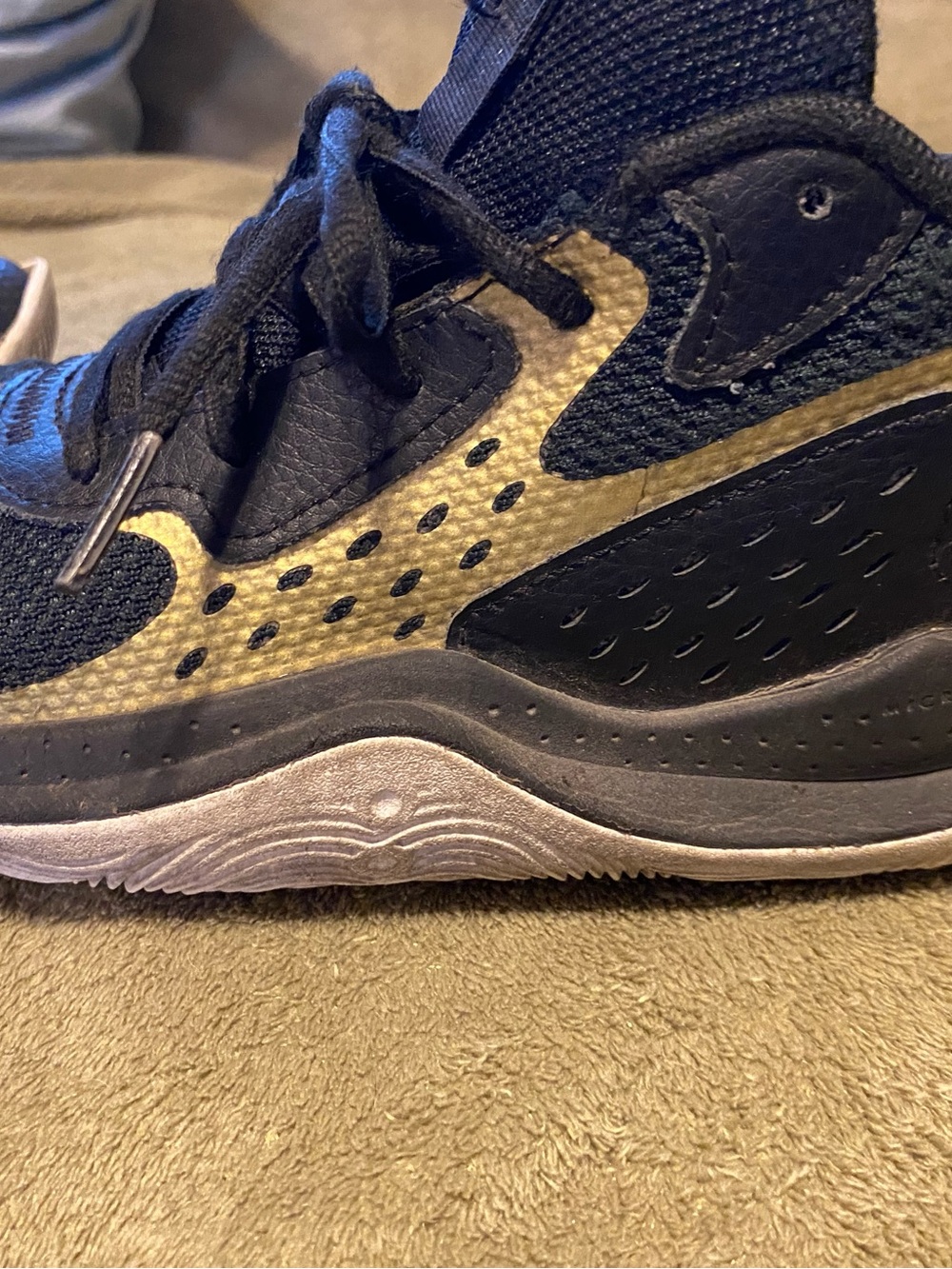 Under Armour Kids Black and Gold Athletic Sneakers
